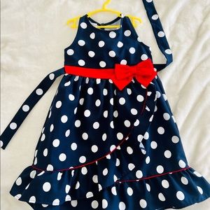 Adorable little girls polkadot party dress. Perfect for any occasion!